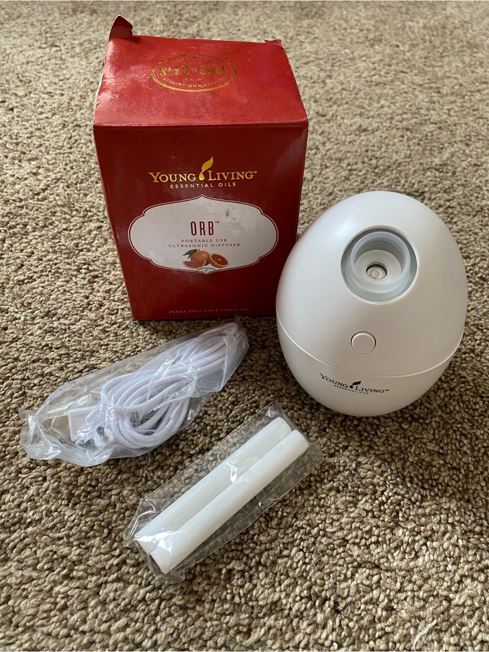 Young Living Portable Egg-Shaped Diffuser in White with Red Box